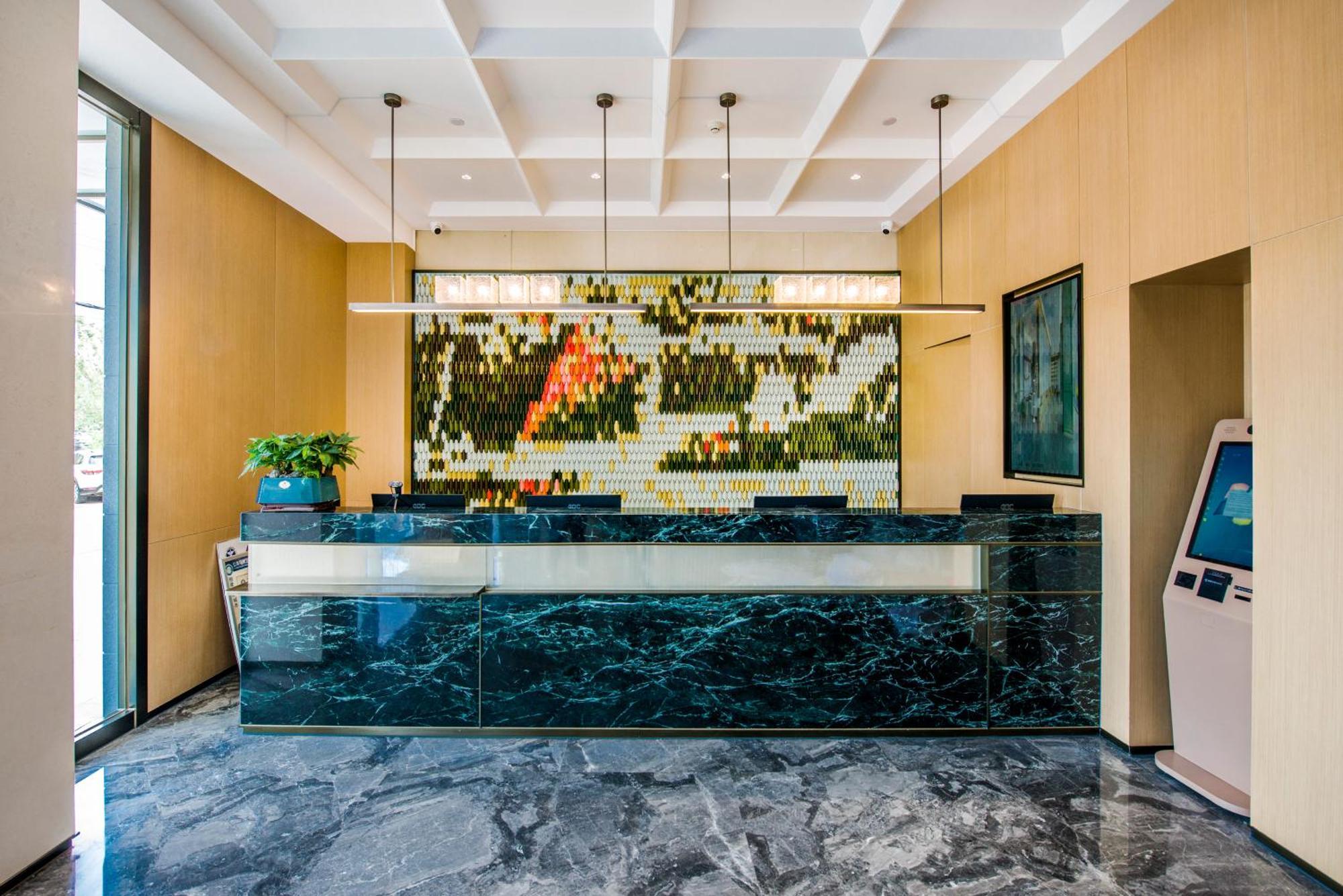 Yiwu Baide Theme Hotel Exterior foto