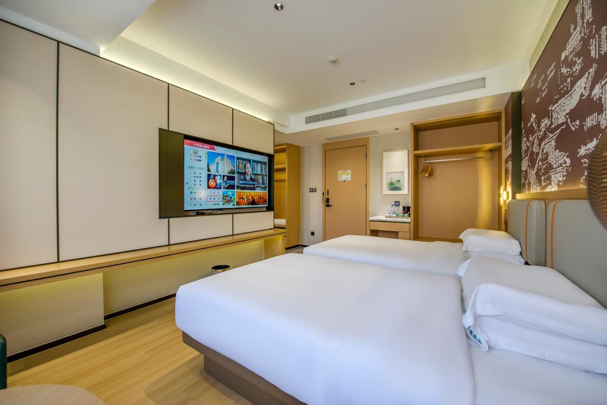 Yiwu Baide Theme Hotel Exterior foto