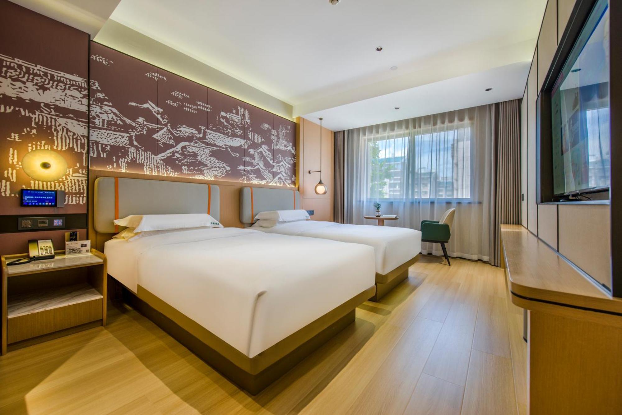 Yiwu Baide Theme Hotel Exterior foto