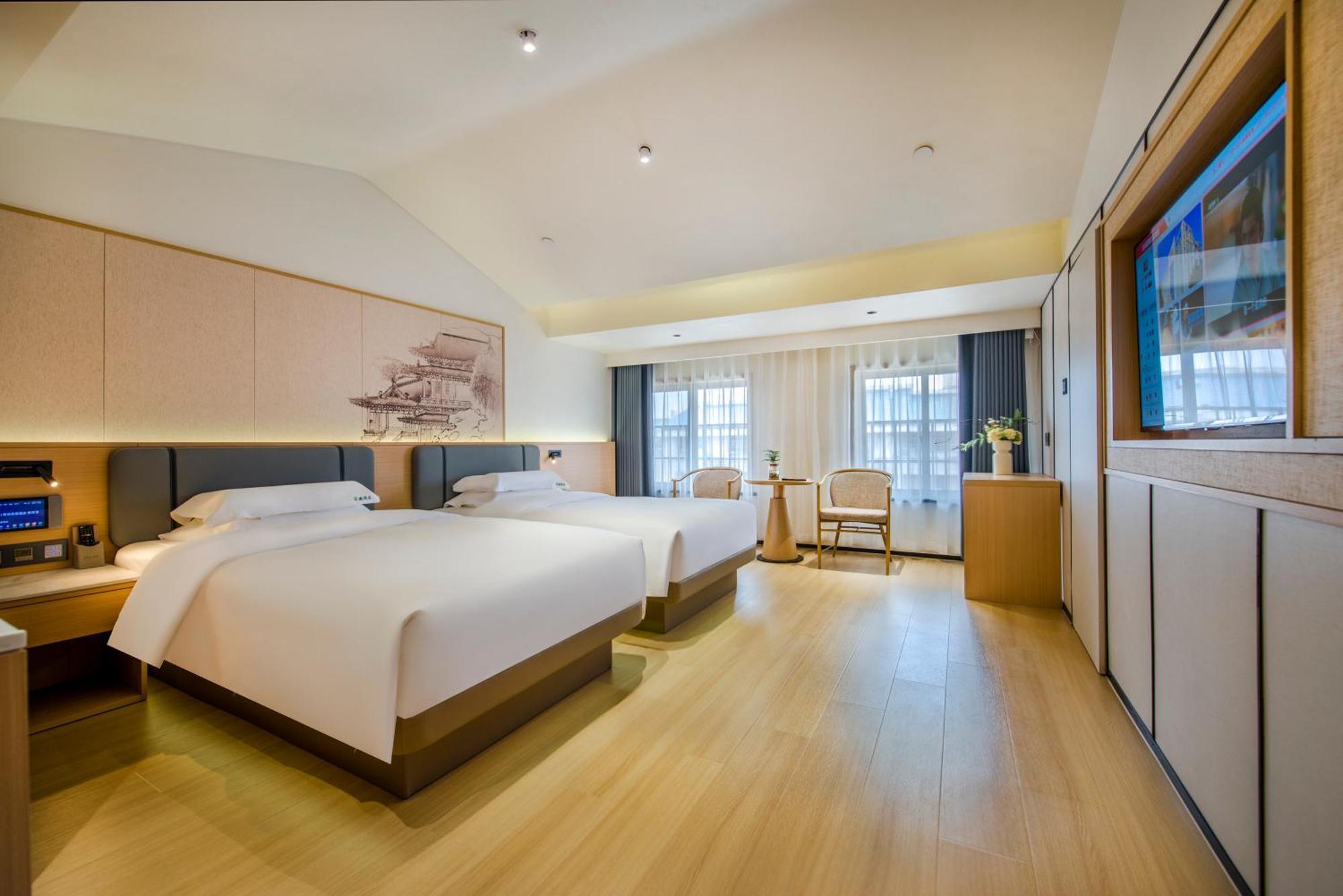 Yiwu Baide Theme Hotel Exterior foto